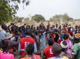 A community in Aweil, South Sudan, dances following the construction of a new borehole through the Programmatic Partnership.